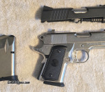 Para Ordnance P10-45, Defender-size double-stack 45acp, polished stainless steel, with extra complete blued upper and two mags