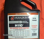 Hodgdon reloading powder: H110 8-pound jug and two Lil’Gun 1-pound containers. Unopened containers are full and fresh.