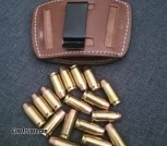 Leather IWB with 17 45acp hollow points 