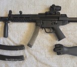 PTR 9R 608, 9mm, roller-delay, 16” barrel, ventilated barrel shroud/vertical grip, Magpul SL telescoping stock plus fixed stock, MLOK handguard. Safe queen!