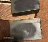 2 Small metal ammo cans with small plastic rifle cleaning stand 