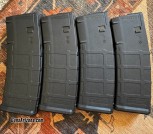 Four Magpul PMAG A4/M4 Gen 2 MOE 5.56 magazines