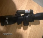 Rifle scope with laser