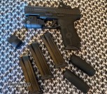 IWI 9mm Masada full size pistol with red dot optic and weapons light 
