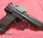 H&K USP Elite 9mm, with Jetfunnel, adjustable rear target sight, 2 (or 9) 18-round magazines, matching case and all original accessories, used but like new