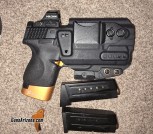 S&W M&P9c with weaponlight, holster, red dot