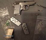Bauer .25 auto new condition stainless steel with extra mag and accessories 