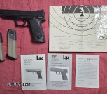 H&K USP Elite 9mm, Jetfunnel, 18-round mags, match 6' barrel, adjustable target sight, matching briefcase/all accessories. The ultimate HK 9mm, and like new!
