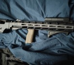 Ruger pcc 9mm with chassis and foldable stock. Vertical pistol grip. Light laser combo. 30 round mag