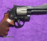 Smith & Wesson 329PD Scandium frame, 44 Magnum / 44 Special, 4' barrel, 6-round titanium cylinder, wood and rubber grip sets. Excellent condition!