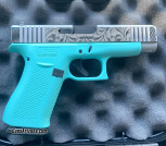 CUSTOM ENGRAVED (Tiffany Blue) GLOCK 48 Get yours engraved too!