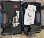 Smith & Wesson S&W 686 plus Revolver with holster, box, and combat sight